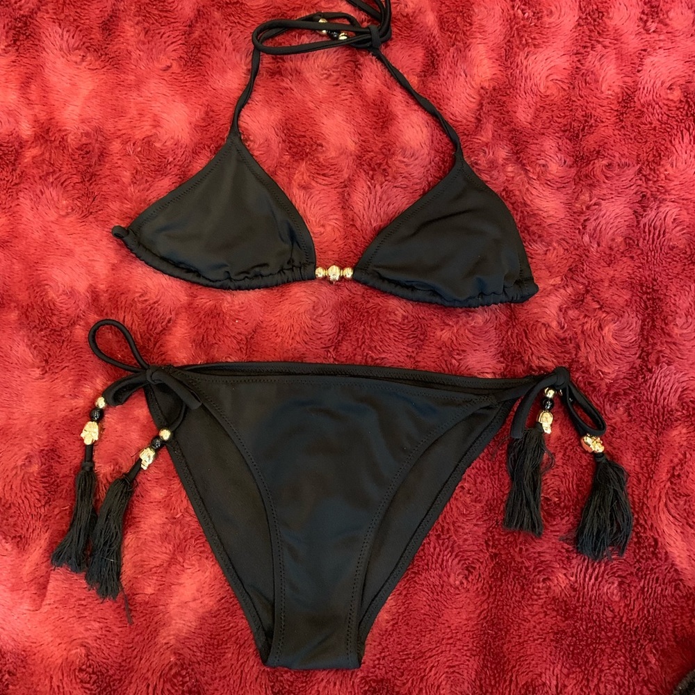 Black H&M string bikini with gold details. Mint